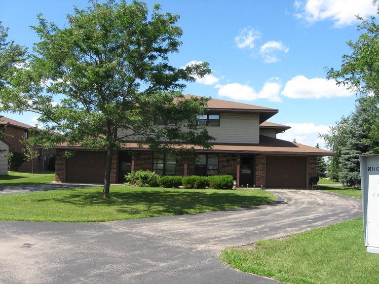 a house with a road in front of it