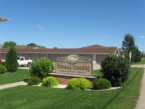 a sign yards in front of a building