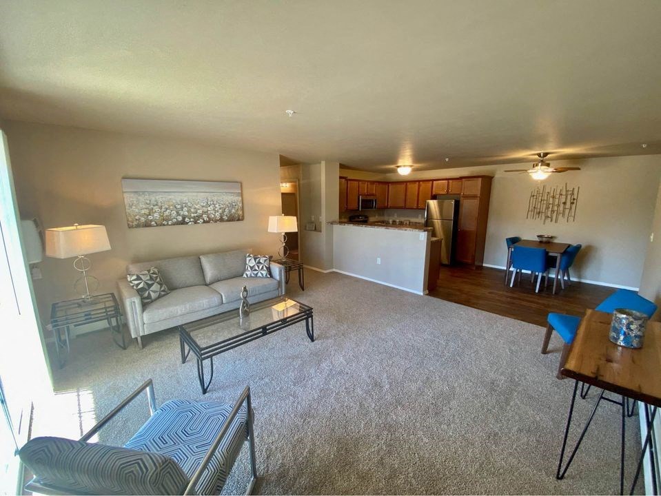 a living room with a couch and a table