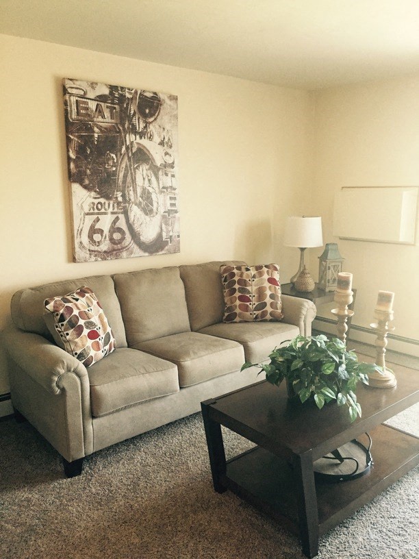 a living room with a couch and a coffee table