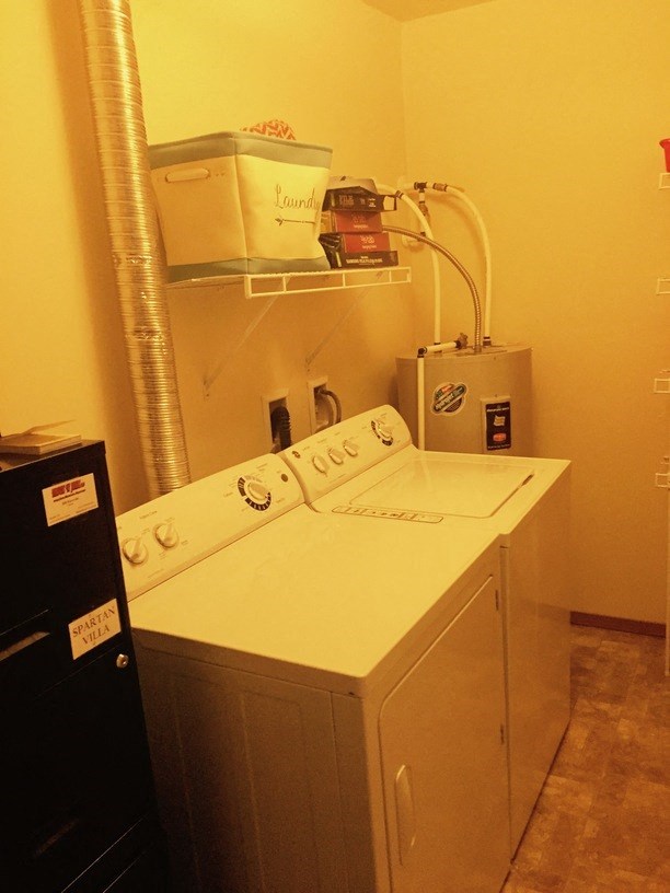 a washer and dryer in a room with a washing machine