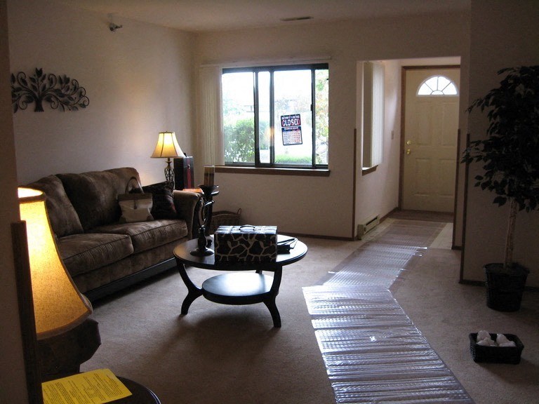 a living room with a couch and a coffee table