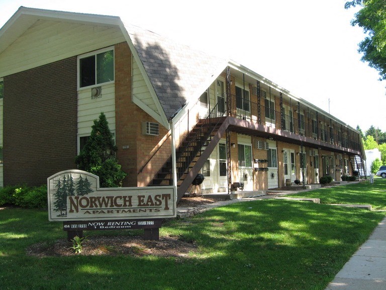 a building with a sign in front of it
