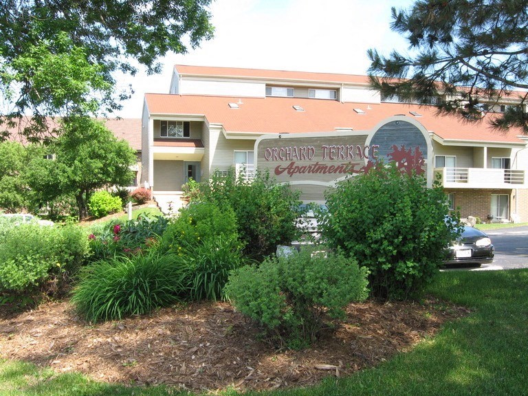 a building with a sign in the front of it