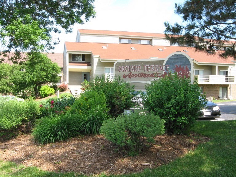 a building with a sign in the front of it