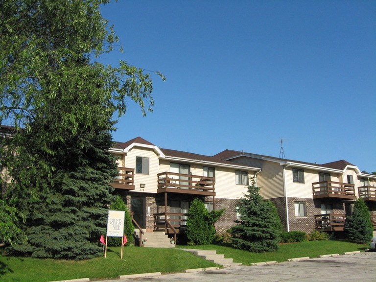 a house with a sign in front of it