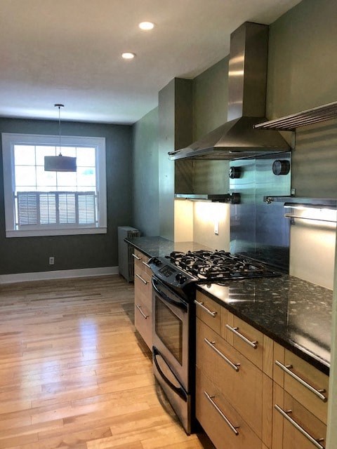 an empty kitchen with a stove and a window