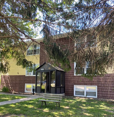 a building with a bench in front of it