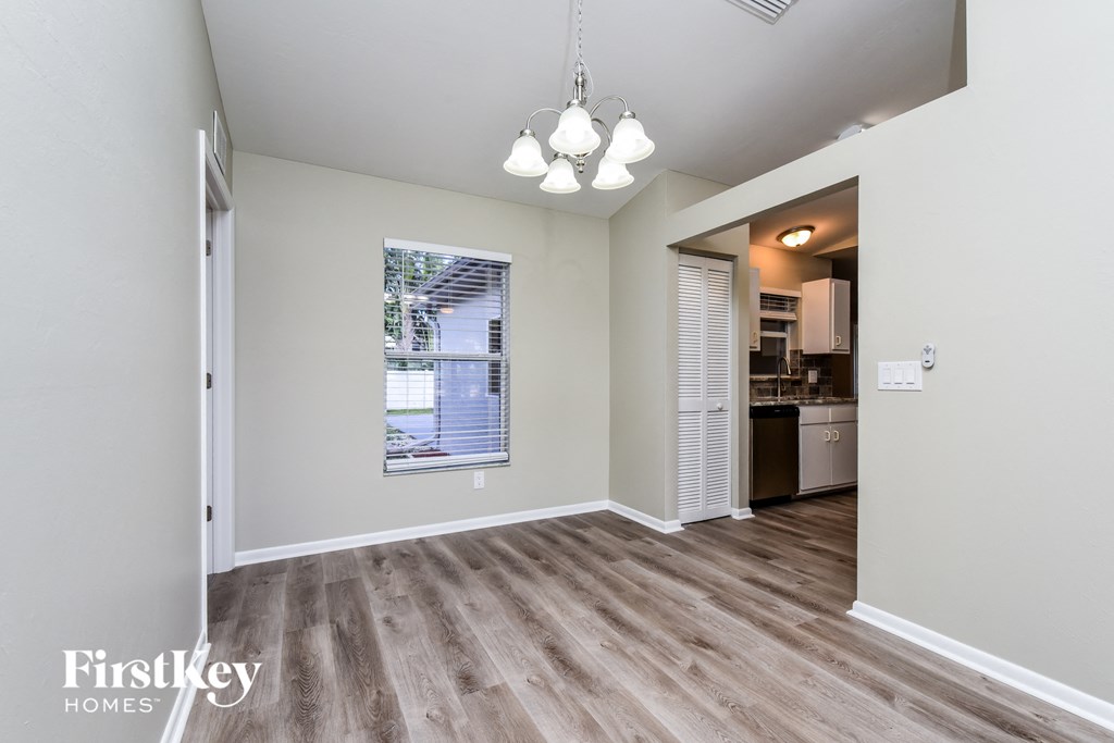 A room with a Firstkey Homes logo on the bottom left corner.