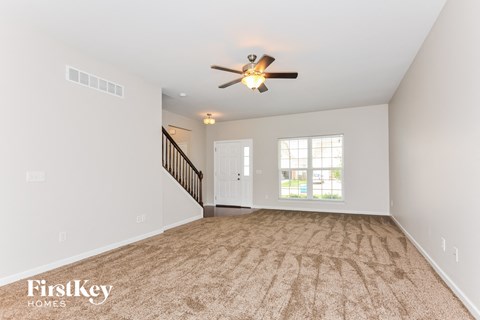the living room is clean and ready to be staged