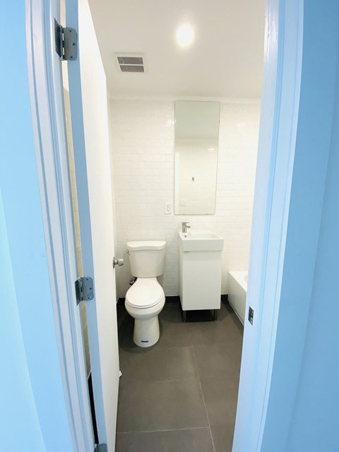 a small bathroom with a toilet and a sink