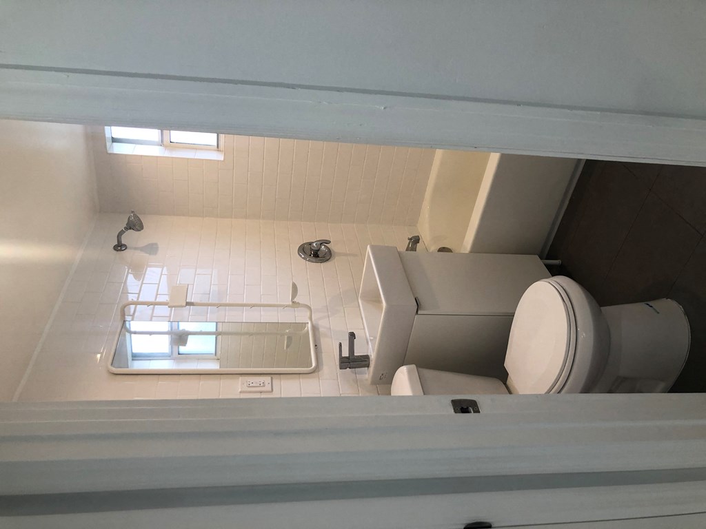 a small bathroom with a toilet and a sink