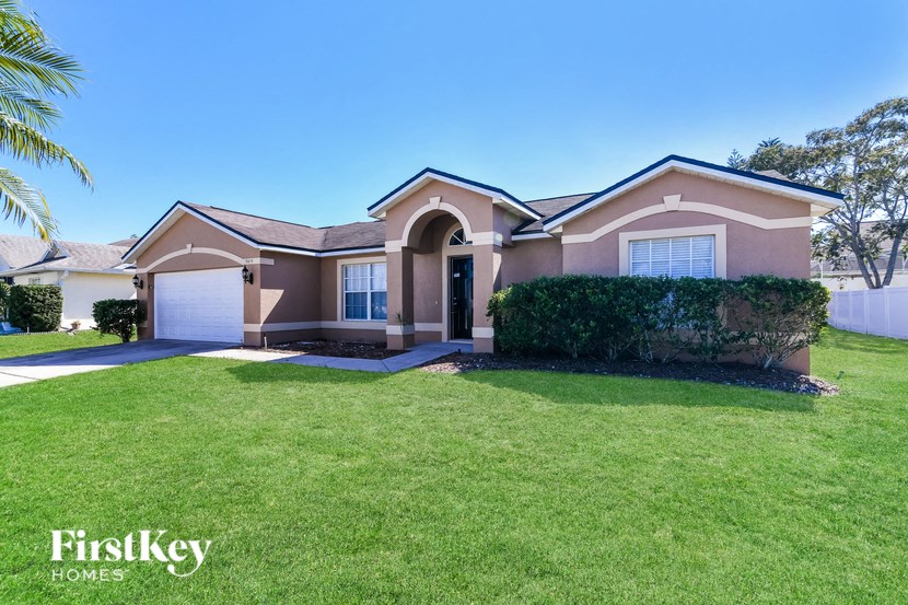 a house with a lawn in front of it
