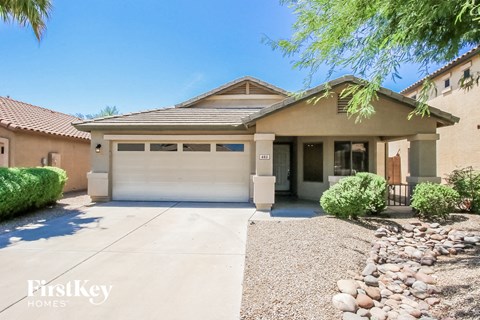 a house with a driveway and a garage door