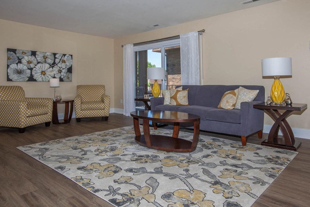 a living room with a couch and a table