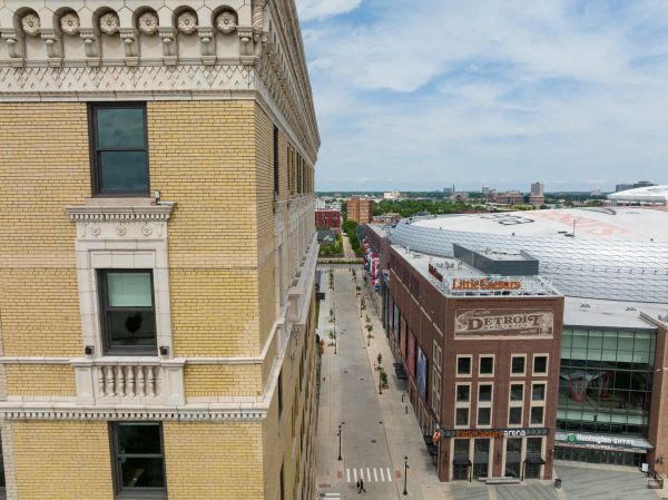 a view of a city street from the roof of a building
