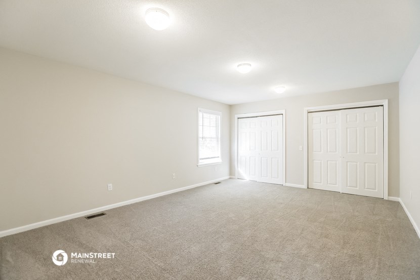 the spacious living room is clean and ready for you to use