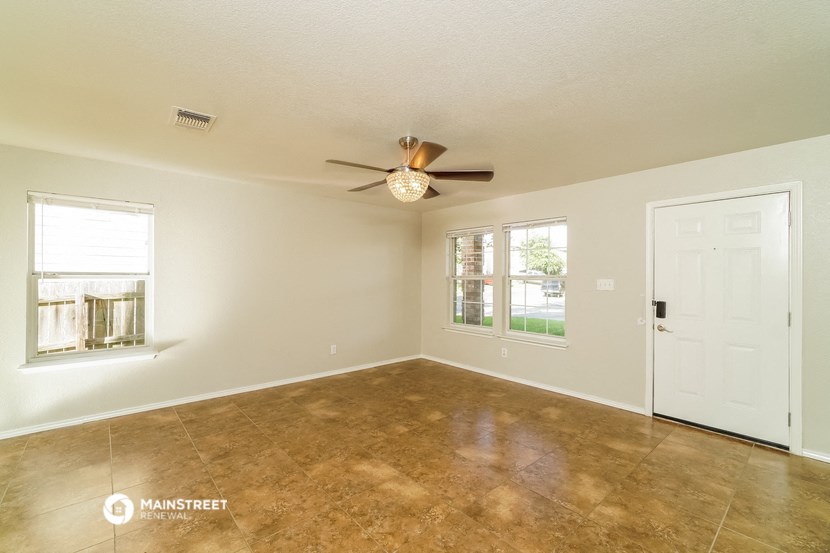the spacious living room is clean and ready for you to use