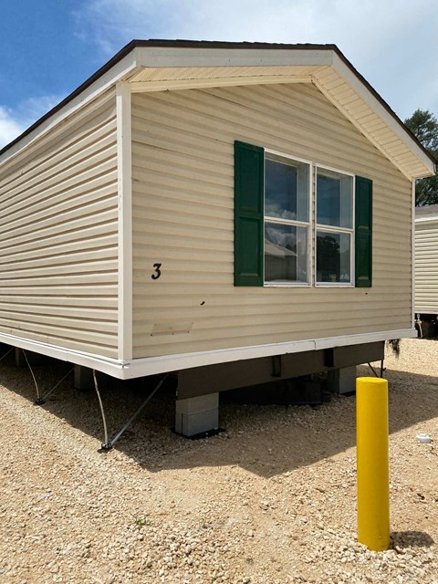 the exterior of a mobile home on a trailer hitch