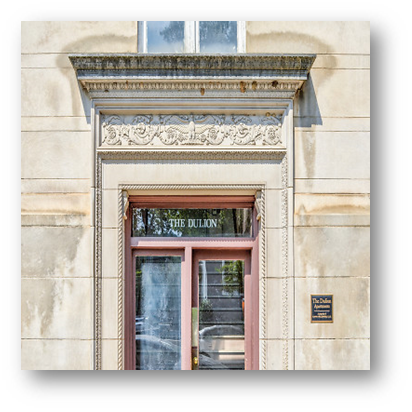 an old building with a red door and a sign that reads the elbow