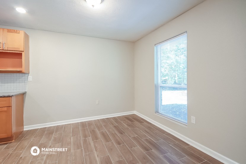 the living room and kitchen are spacious and ready for you to use