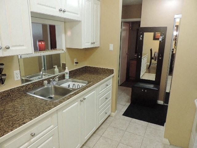 a kitchen with a sink and a counter top