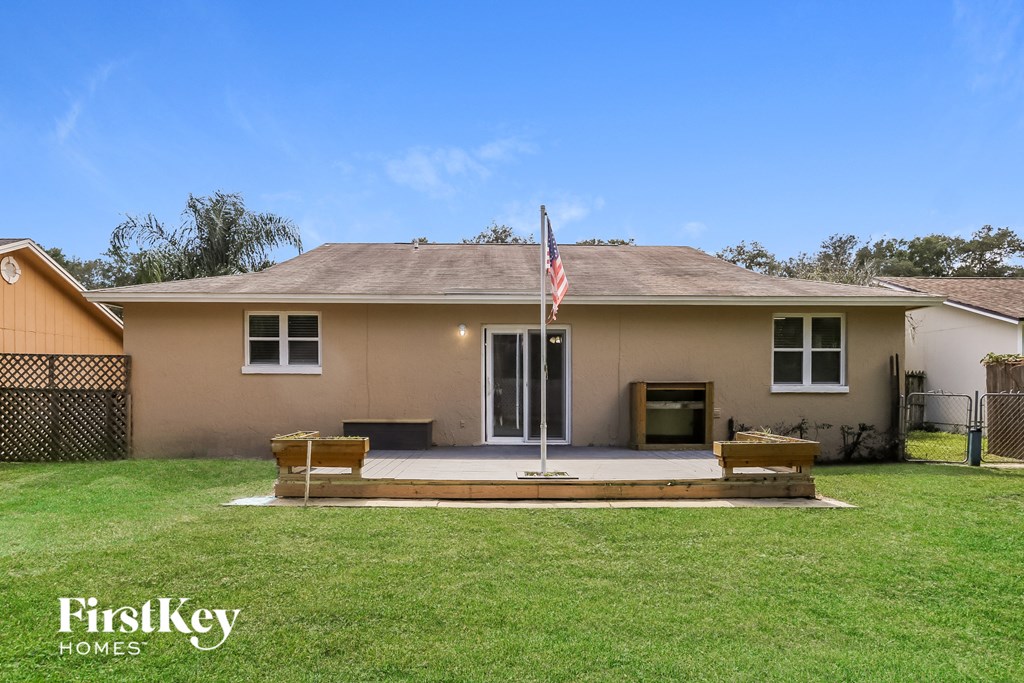 a house with an flag on the front porch