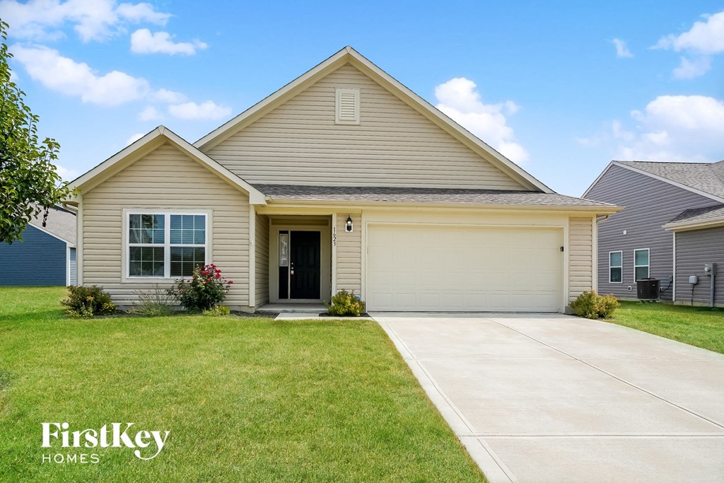A house with a garage is for sale by FirstKey Homes.