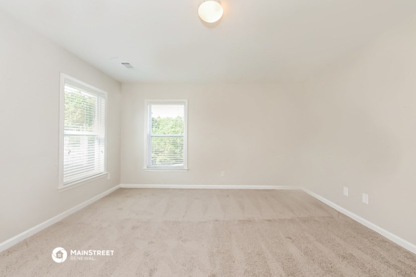 the spacious living room is clean and ready for you to use