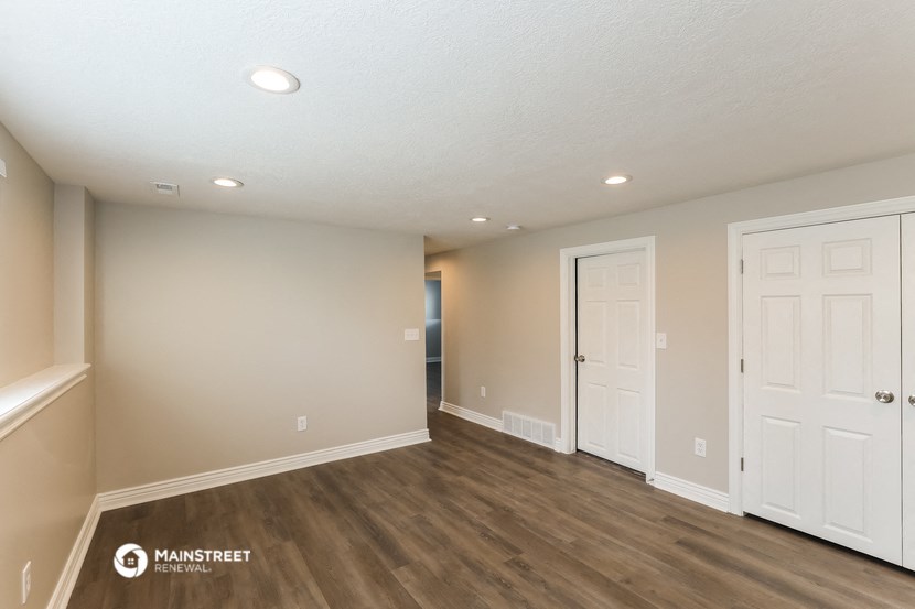 the spacious living room and hallway of a manufactured home