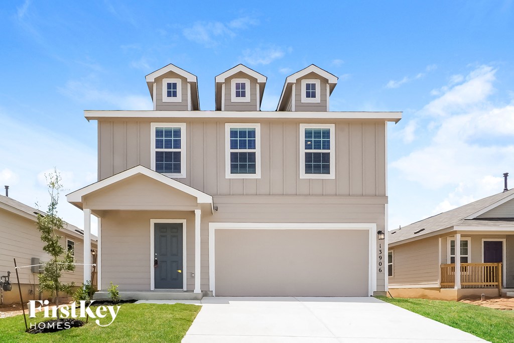 A modern house with a garage is for sale by FirstKey Homes.