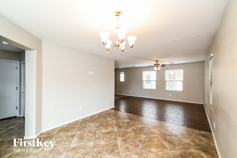 the living room and dining room are spacious and clean