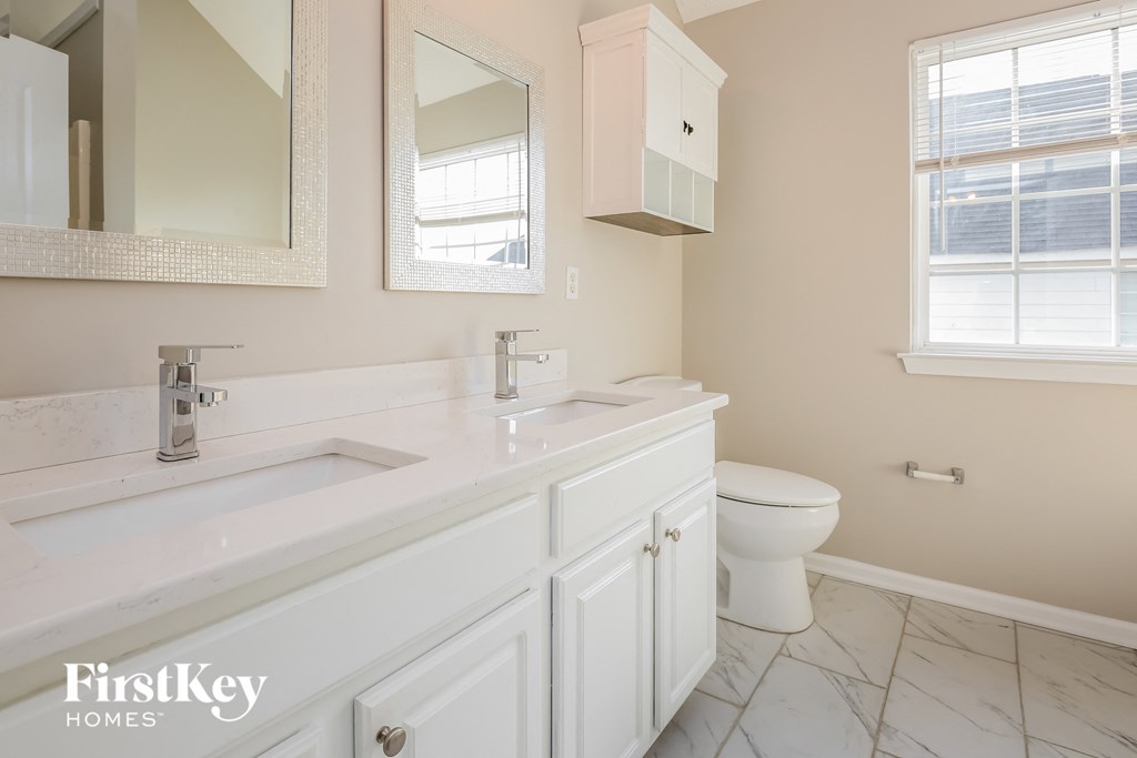 a bathroom with a sink and a toilet