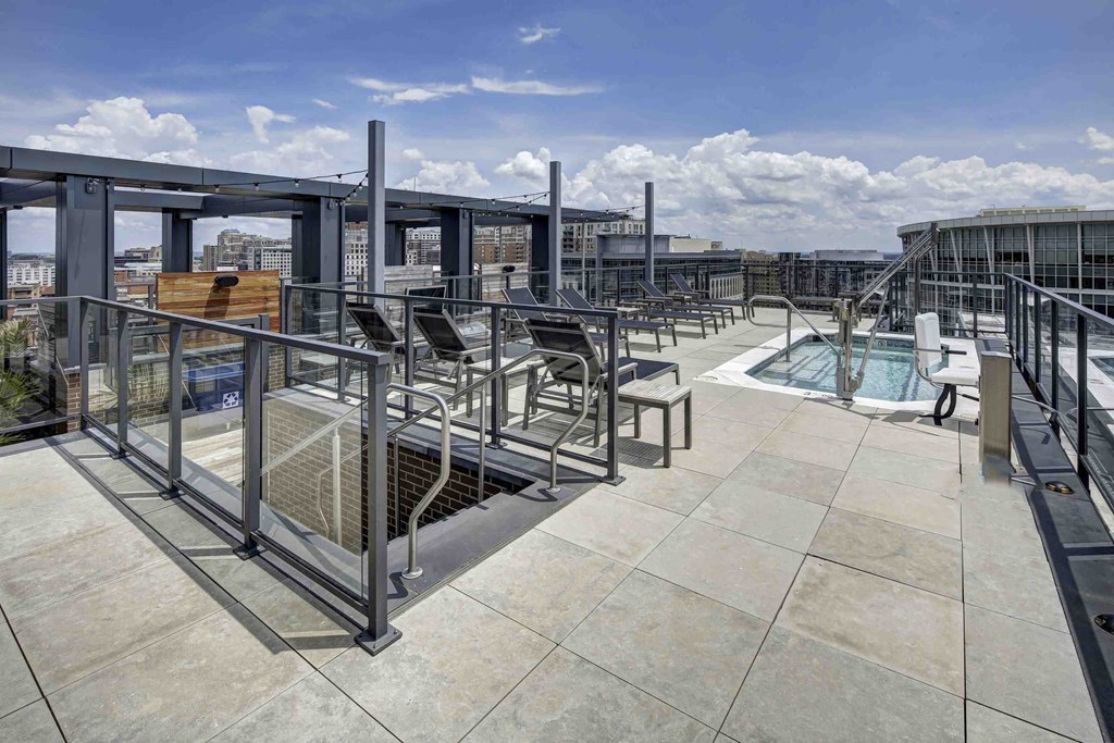 a rooftop pool is shown on the roof of a building