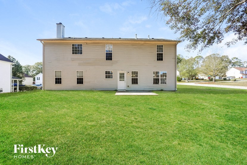 an old with a lawn in front of it