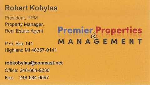 A business card for Robert Kobylas, President of Premier Properties Management.