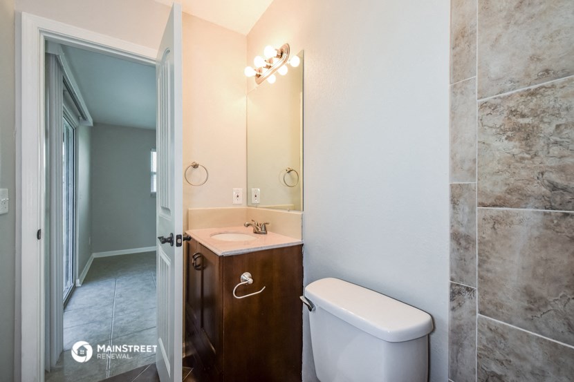 a small bathroom with a toilet and a sink