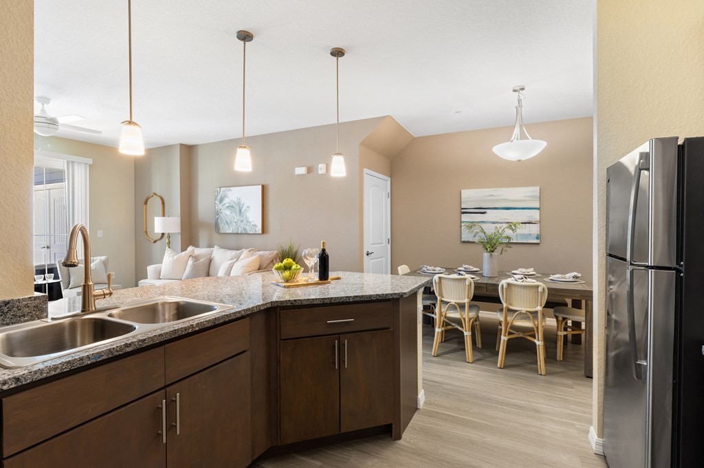 kitchen and dining room at the district flats apartments in lenexa