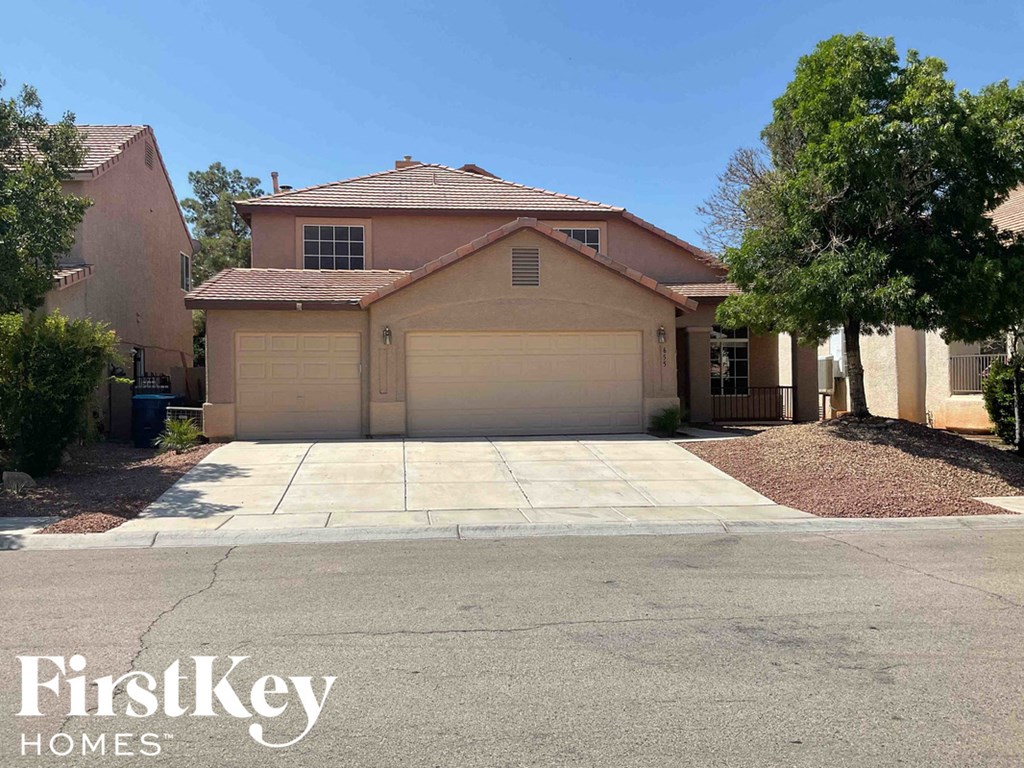 A house with a garage is for sale by FirstKey Homes.