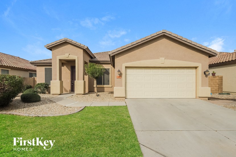 a house with a driveway and a garage door