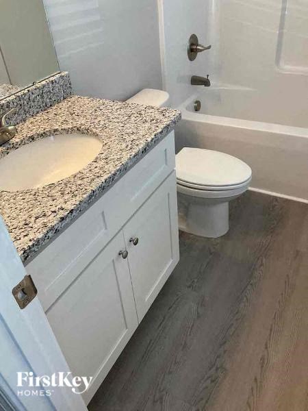 a bathroom with a sink and a toilet