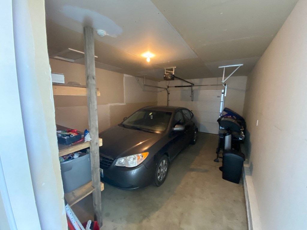 a car parked in a small garage