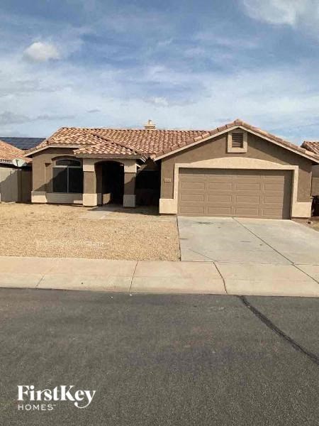 A house with a garage is shown in the image.