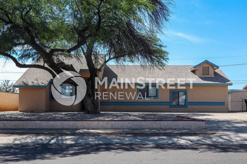 a building with a tree in front of it