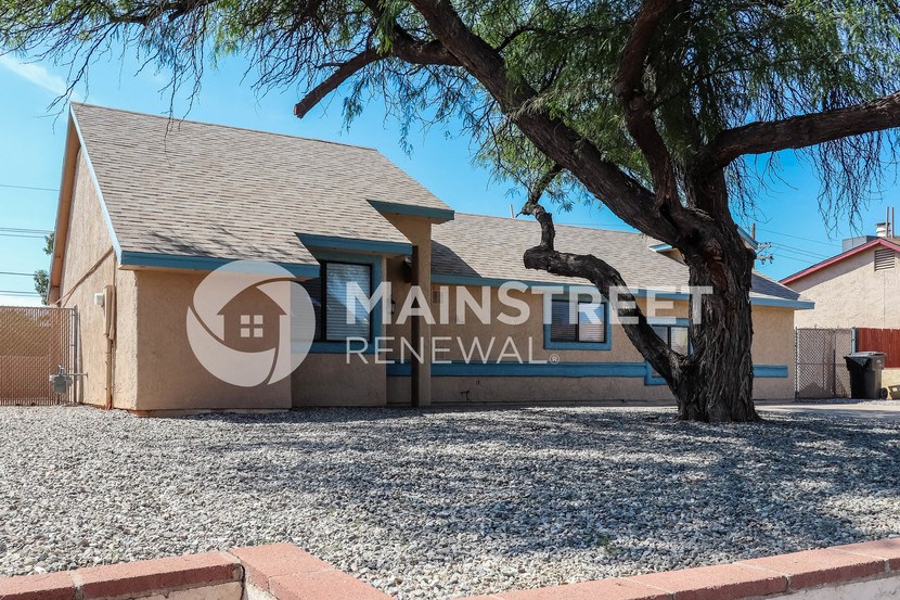 a building with a tree in front of it