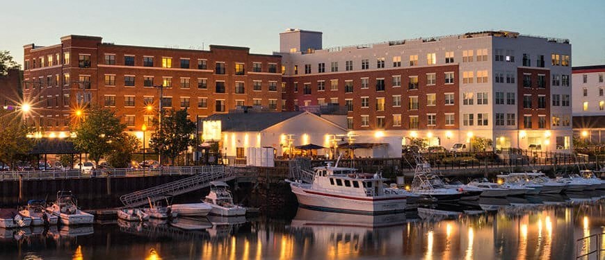 a group of boats are docked in a harbor