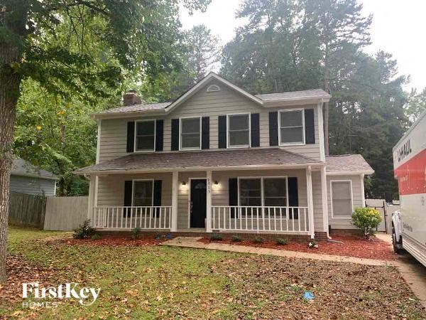 a house with a truck parked in front of it