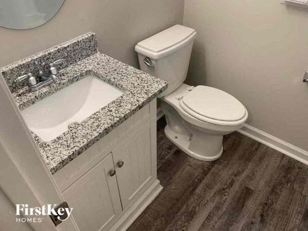 a bathroom with a sink and a toilet