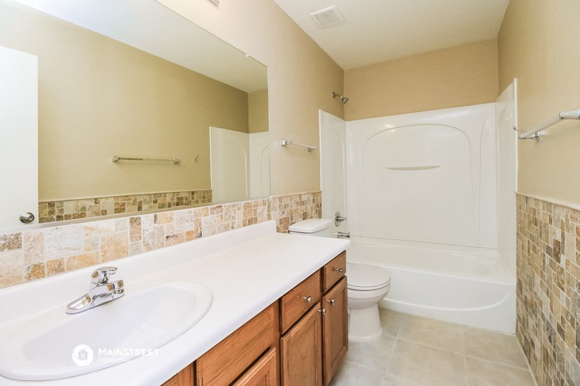 a bathroom with a sink and a toilet