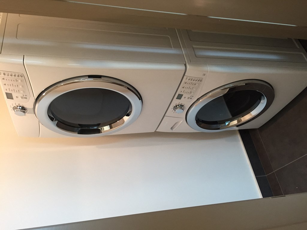 a white washer and dryer in a room